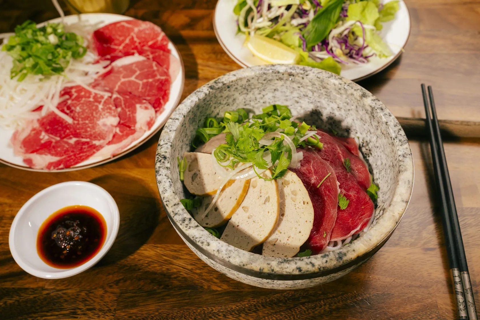 Phở Thố Đá stone bowl with fish cake and red-coin rare beef near Wakefield Street walk