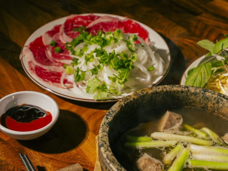 Bún Bò Huế Thố Đá — spicy beef noodle soup in a stone bowl