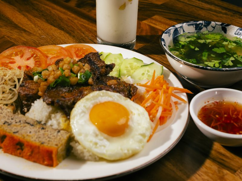 Cơm Sườn Bì Chả — broken rice with grilled pork, shredded pork and egg meatloaf